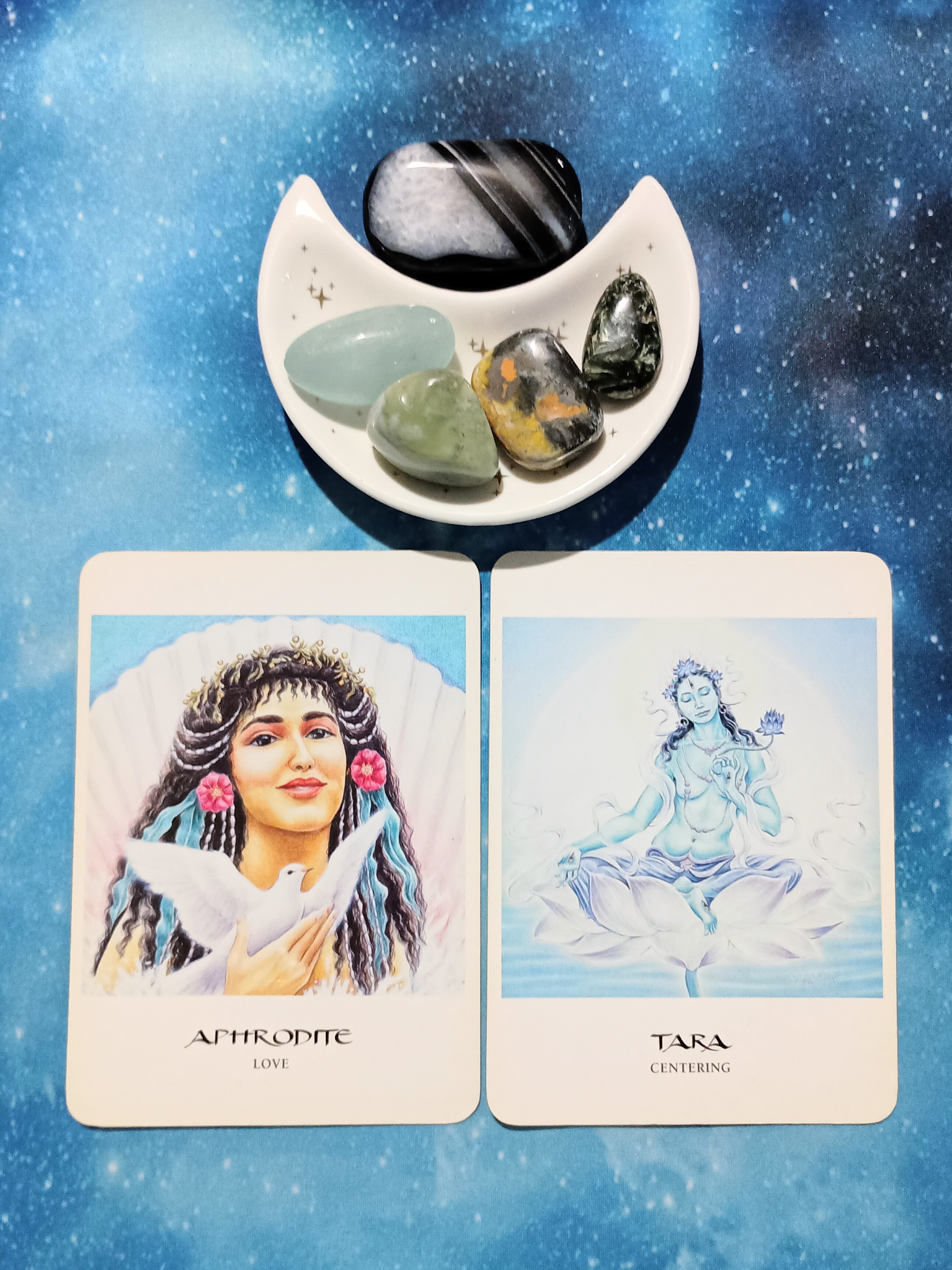 Let Love Be Your Guide: A Message From the Universe, 2Goddess Oracle cards and crystals on a starry blue background
