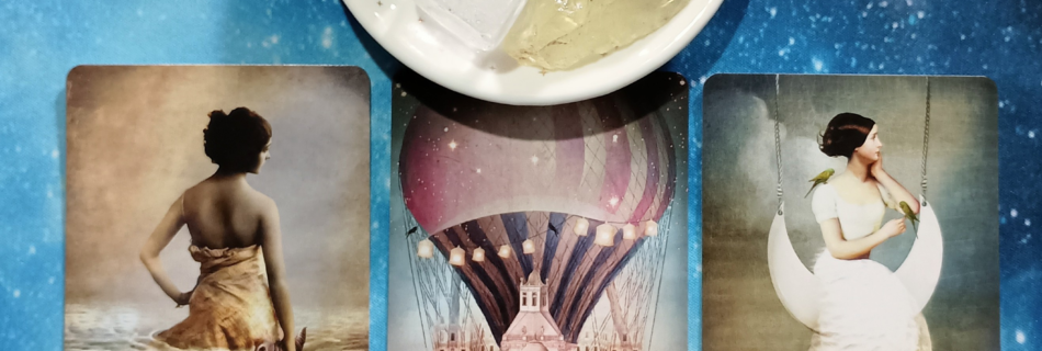 Keep Swimming! A Message From the Universe, 3 Oracle of Mystical Moments cards and crystals on a starry blue background