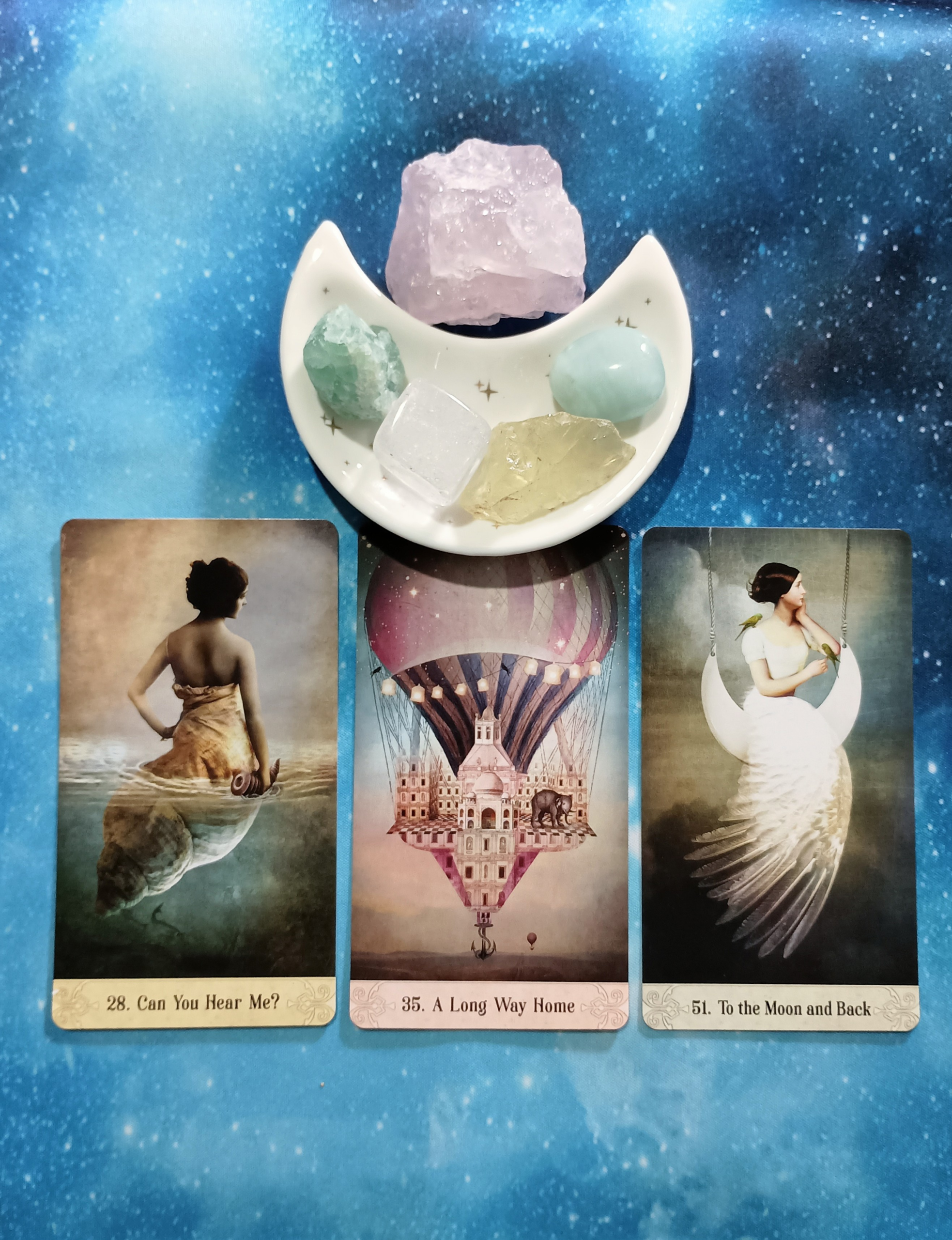 Keep Swimming! A Message From the Universe, 3 Oracle of Mystical Moments cards and crystals on a starry blue background