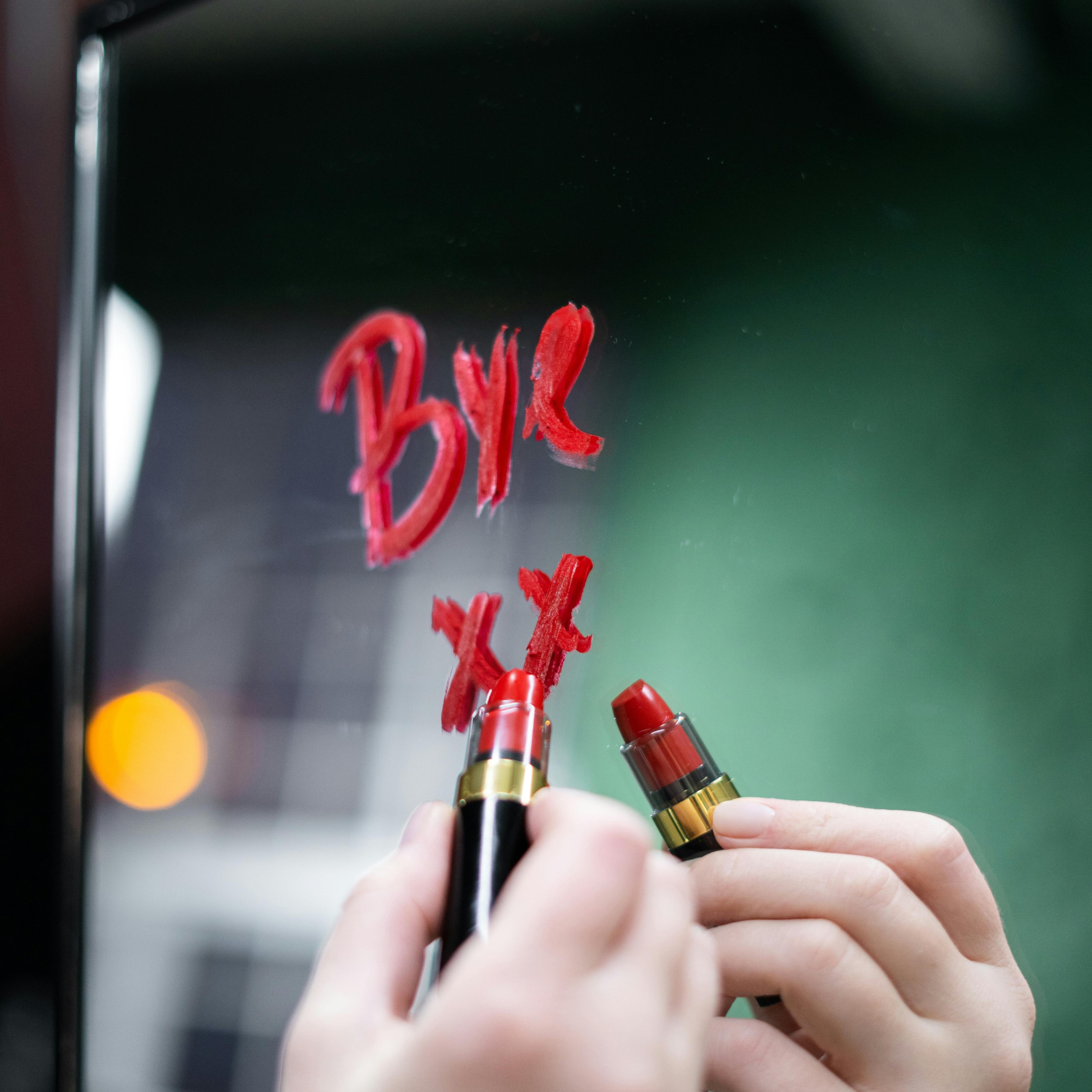 "Bye" written on a mirror in lipstick - Goodbye 2025! Sending Love, Gratitude, and Updates!