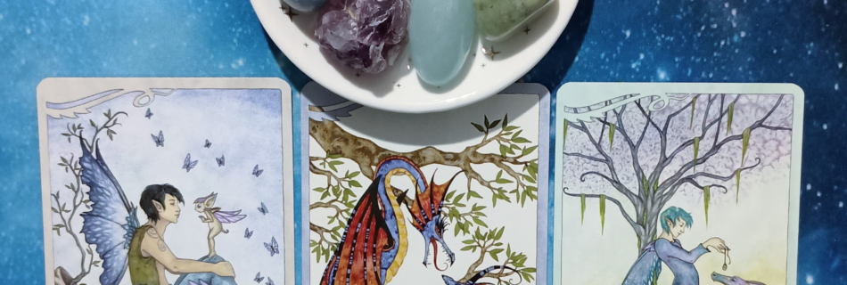 Attitude Adjustment Needed! A Message From the Universe, 3 For the Love of Dragons Oracle cards and crystals on a starry blue background