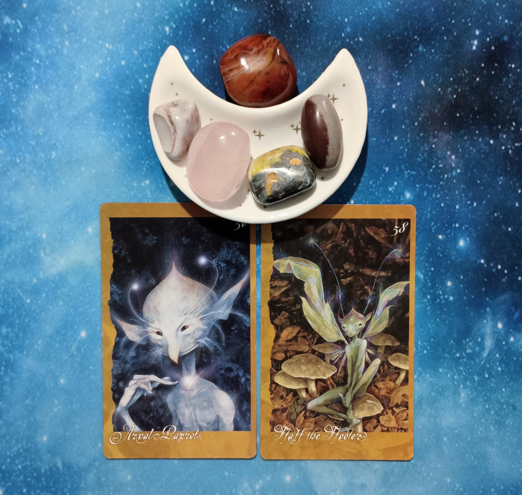 Speak Truth, but Stay Grounded: A Message From the Universe, 2 Faeries’ Oracle cards and crystals on a starry blue background